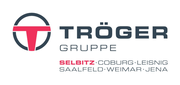 Stärke aus Tradition. Johann Tröger gründete im Jahr 1988 im oberfränkischen Hof eine Wagen- und Kesselschmiede. Damit legt er den Grundstein für unser Unternehmen. Wir sind bis heute ein inhabergeführtes Familienunternehmen, welches in der fünften Generation erfolgreich das Kfz-Handwerk betreibt. Seit 1918, also seit mehr als 100 Jahren mittlerweile, sind wir außerdem MAN Truck & Bus Vertragspartner und damit der älteste Servicepartner von MAN Truck & Bus weltweit.
Mit dem Stammsitz in Selbitz und den weiteren Betrieben unserer Firmengruppe in Coburg, Saalfeld, Jena, Weimar und Leisnig ist unsere Unternehmensgruppe eine der wichtigsten und größten MAN-Repräsentant im Herzen Europas. Darüber hinaus gehört auch eine eigene Nutzfahrzeugvermietung mit über 200 Fahrzeugen zur Firmengruppe. Stärke aus Tradition. Johann Tröger gründete im Jahr 1988 im oberfränkischen Hof eine Wagen- und Kesselschmiede. Damit legt er den Grundstein für unser Unternehmen. Wir sind bis heute ein inhabergeführtes Familienunternehmen, welches in der fünften Generation erfolgreich das Kfz-Handwerk betreibt. Seit 1918, also seit mehr als 100 Jahren mittlerweile, sind wir außerdem MAN Truck & Bus Vertragspartner und damit der älteste Servicepartner von MAN Truck & Bus weltweit.
Mit dem Stammsitz in Selbitz und den weiteren Betrieben unserer Firmengruppe in Coburg, Saalfeld, Jena, Weimar und Leisnig ist unsere Unternehmensgruppe eine der wichtigsten und größten MAN-Repräsentant im Herzen Europas. Darüber hinaus gehört auch eine eigene Nutzfahrzeugvermietung mit über 200 Fahrzeugen zur Firmengruppe.