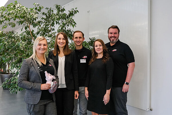 Gruppenfoto Team zu sehen ist ein Teamfoto